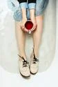 Top View Of Woman's Sitting In A Bathtub With A Cup Of Red Tea, Selective Foc Stock Photos
