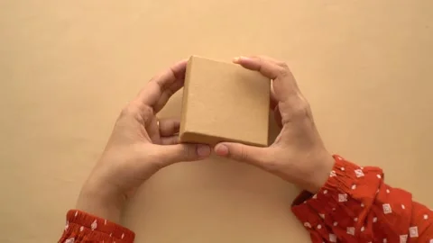 Top view of women open a empty small gift box 库存影片 229854790