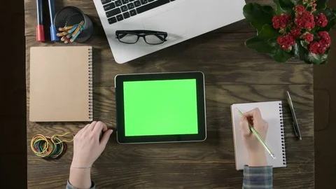 Top view of wooden table with office supplies Stock Footage 74698990