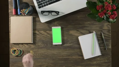 Top view of wooden table with office supplies Stock Footage 74699053
