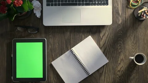 Top view of wooden table with office supplies Stock Footage 74699204