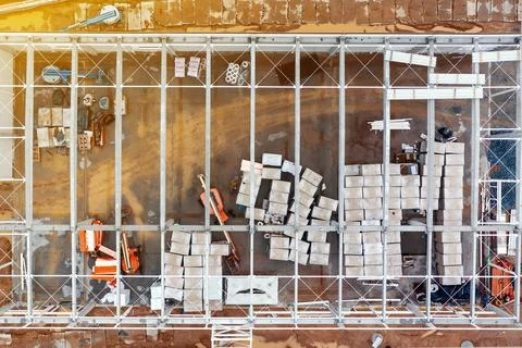 Top view of the work area and large steel frame of a large commercial buildin Stock Photos