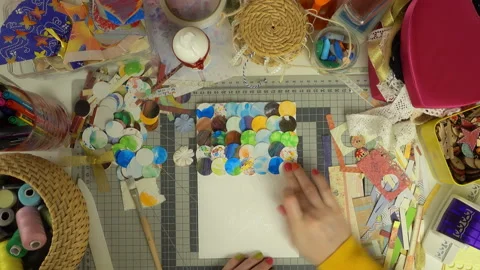 Top view of the work of craftswoman. Time lapse of scrapbooking process. Stock Footage 100410358