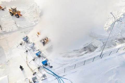Top view of the work of four snow cannons for the production of artificial sn Stock Photos