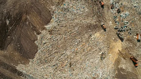 Top view of the work of refuse collection equipment disposes of waste. The Stock Footage 114494077