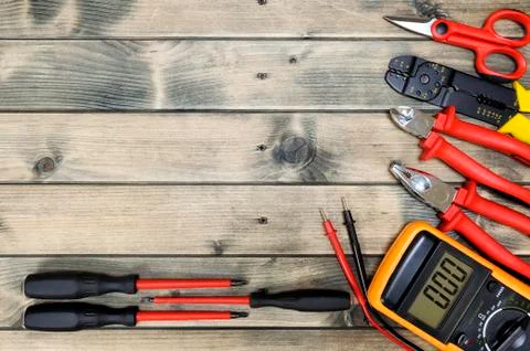 Top view of work tools for residential electrical installation on antique woo 스톡 사진