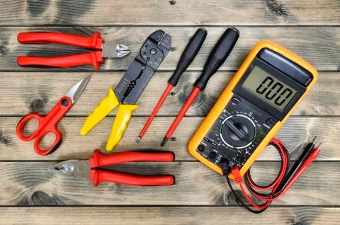 Top view of work tools for residential electrical installation on antique woo Stock Photos