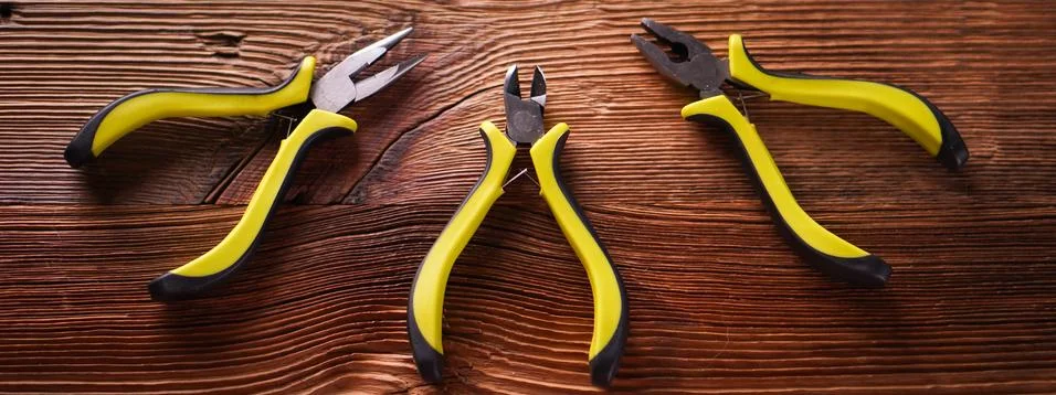 Top view of work tools on wooden background. Stock Photos
