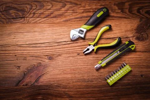 Top view of work tools on wooden background. Foto stock