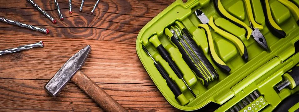 Top view of work tools on wooden background. Foto stock