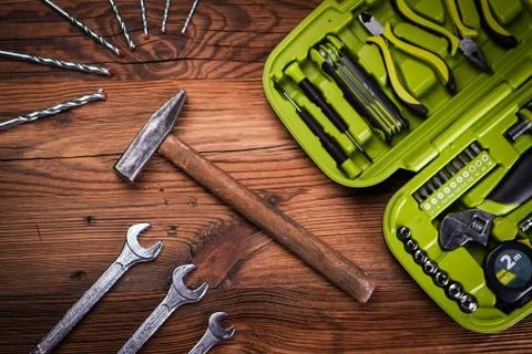Top view of work tools on wooden background. Foto stock