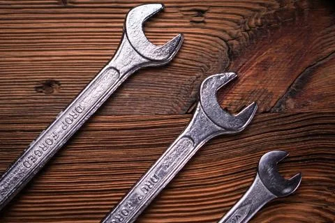 Top view of work tools on wooden background. Stock Photos