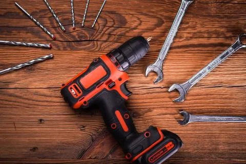 Top view of work tools on wooden background. Stock Photos