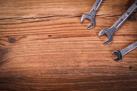Top view of work tools on wooden background. Stock Photos