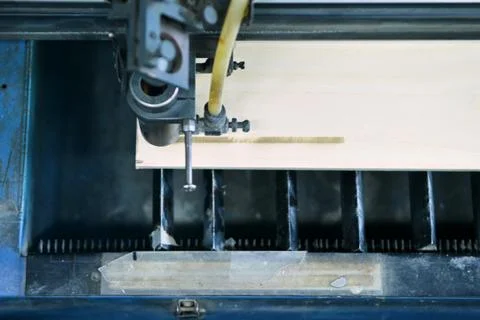 Top view of the working area of a laser engraving machine while burning Stock Photos