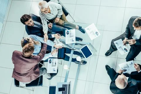 Top view. the working group is working on the financial report. Stock Photos