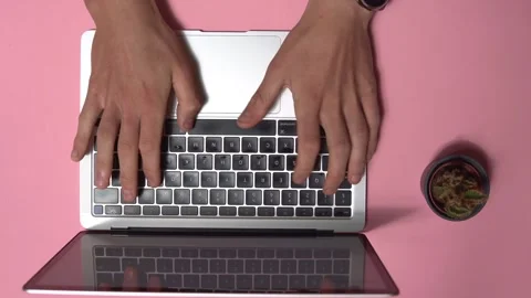 Top view of working on a laptop Video stock 248061073