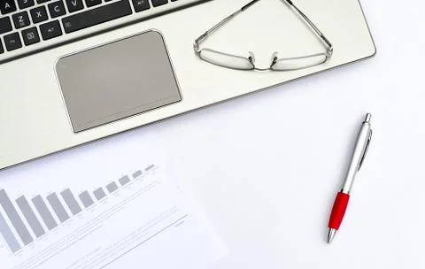Top view of working place elements on white table Foto stock