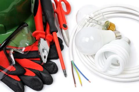 Top view of working tools and components of the electrical system on white ba Foto stock