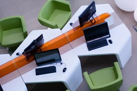 Top view of the workplace with computers Stock Photos