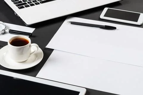 Top view of workplace with digital devices Stock Photos