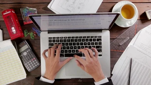 Top view of a workplace where businessman is typing some document Stock Footage 88763939