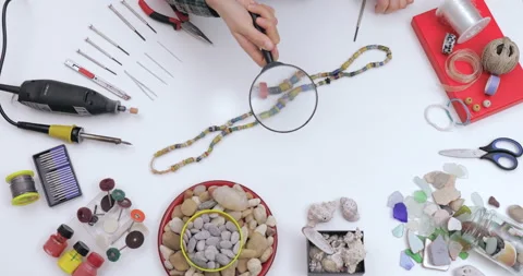 Top view on workspace table at craft workshop with tools and materials. Stock Footage 143197682