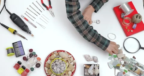 Top view on workspace table at craft workshop with tools and materials. Stock Footage 143205615