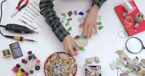 Top view on workspace table at craft workshop with tools and materials. Stock Footage 143205739