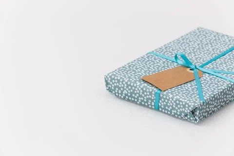 Top view on a wrapped in paper gift for birthday, Christmas, or other celebra Stock Photos
