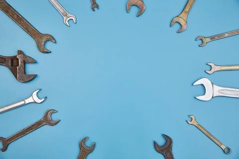 Top view wrenches on a blue background with space for text Stock Photos