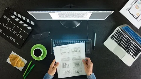 Top view of writer's workplace - big pc monitor with cup of coffee on the table Vídeo Stock 77667344
