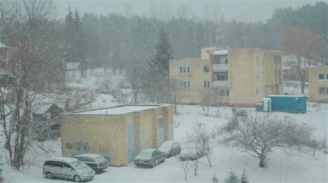 Top view of a yard in falling snow  Stock Footage 47866661