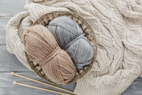Top view yarn basket with pullover Stock Photos