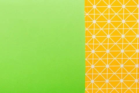 Top view with yellow empty kitchen napkin isolated on table background. Fol.. Stock Photos