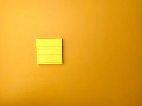 Top view yellow sticky note on a yellow background Stock Photos