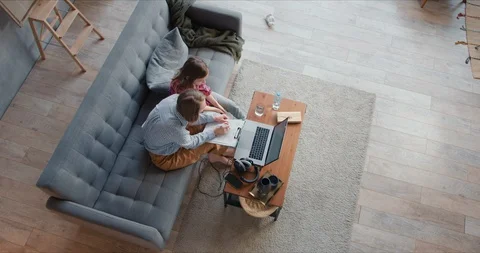 Top view young Caucasian single mother is helping homeschooled teenage daughter 스톡 동영상 129272529