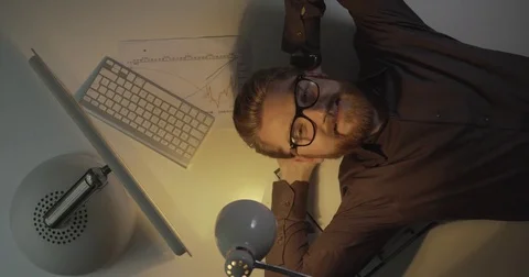 Top view of the young happy handsome businessman with red beard and glasses Stock Footage 82689248