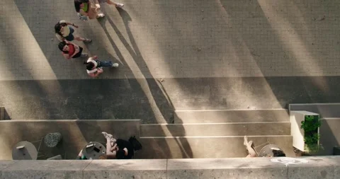 Top view of young people walking on stre... | Stock Video | Pond5