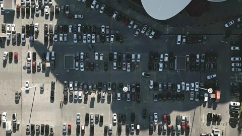 Top view zoom out car driving on parking place. Aerial view from above flyi.. Stock-Footage 290854892