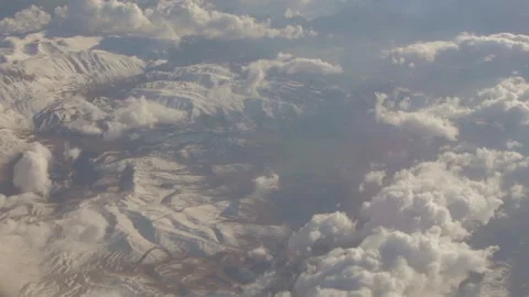 Top view,cloud movement and ground surface, camera movement, view from the airpl Stock Footage 246144120