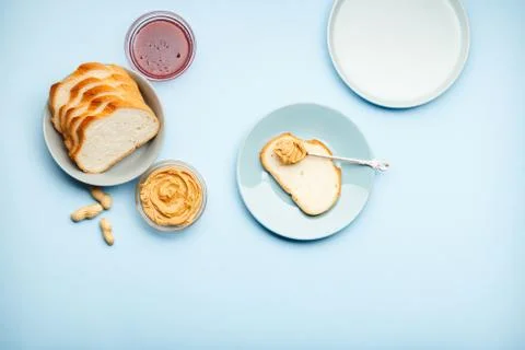 Top view,flat lay process of cooking breakfast, spreading bread, toast with Stock Photos