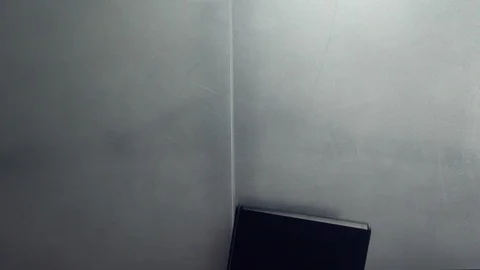 Top viow of desk with empty book Stock Footage 87255477