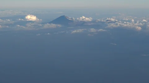 Top of volcano coming out of clouds Stock Footage 112482880