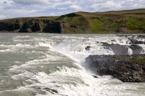 Top of waterfall flowing over rocks on  pjorsa river Stock Photos