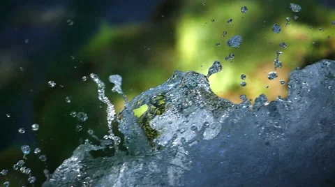 Top of a waterfall in slow motion close up forest in background Stock Footage 52456774