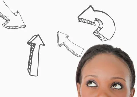 Top of woman's head looking at 3D grey arrows against white background Stock Photos
