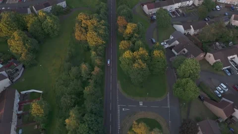 Topdown 4k Drone Tracking View, Delivery Van Driving on Village Street Stock Footage 344435956