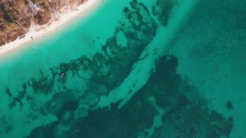 Topdown Aerial of a busy beach section in Zanzibar Stockbeeldmateriaal 245050636