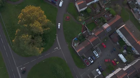 Topdown Aerial Tracking View, Delivery Van Driving on Village Street Stock Footage 344473807